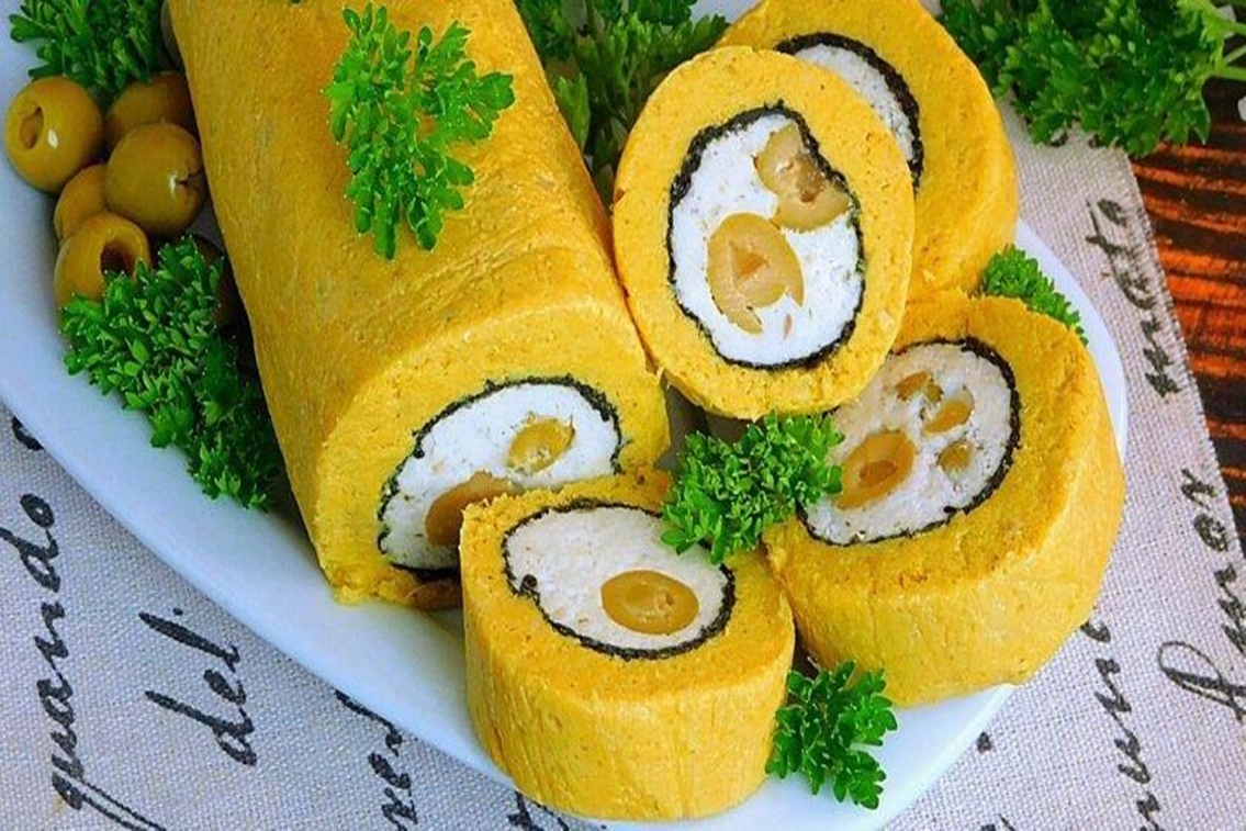 Un aperitiv frumos și delicios pentru masa festivă. O ruladă apetisantă de pește cu măsline va face senzație